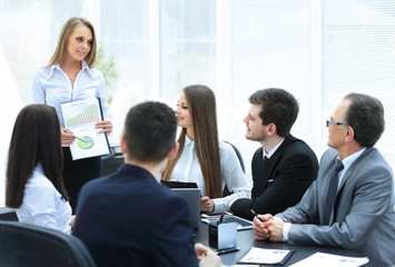 business woman conducting a presentation for business colleagues