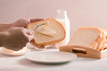 Sliced white bread and butter shot from a high angle view