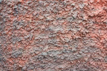 Vintage surface of old shabby wall with falling off plaster, beige-brown shades, background, texture