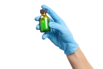 Hand in a blue rubber glove holding a bottle with unknown liquid of light green color, isolated on...