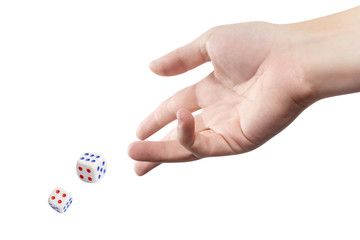 The dice game: hand throwing game cubes, isolated on white background