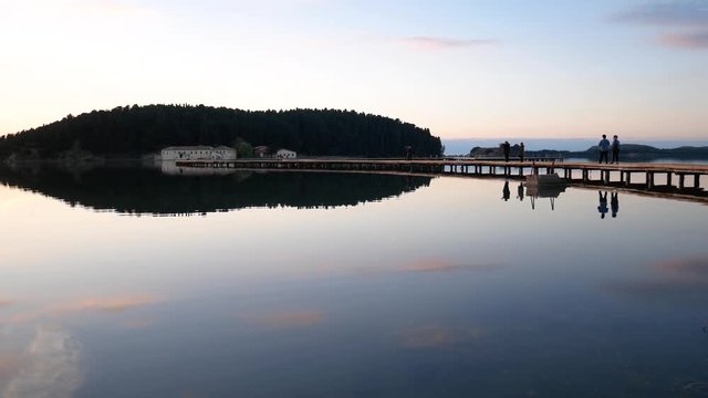 Vlore, Albania - december 28 2018: Byzantine St. Mary's Monastery at sunset on Zvernec Island in lagoon of Narta,