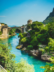 old Mostar bridge over the river - obrazy, fototapety, plakaty