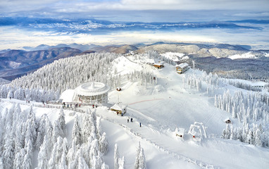 Aerial view over the spectacular ski slopes in the Carpathians mountains, Panoramic view over the...