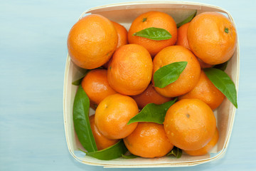 Juicy mandarins in a box. 