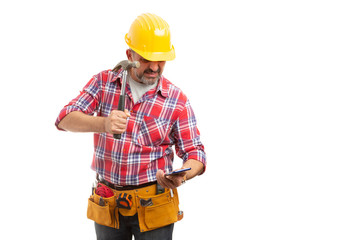 Builder preparing to break phone screen.