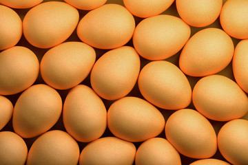 Many natural colored brown chicken eggs. Easter eggs. 3d illustration.