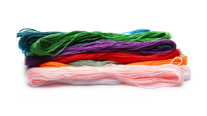Colorful string for sewing and knitting, isolated on white background