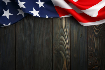 American flag on dark wooden board