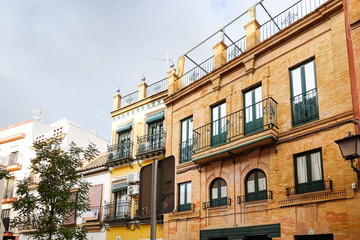 Fototapeta na wymiar SEVILLA, SPAIN - January 13, 2018: Andalusia style building in Sevilla city, Spain