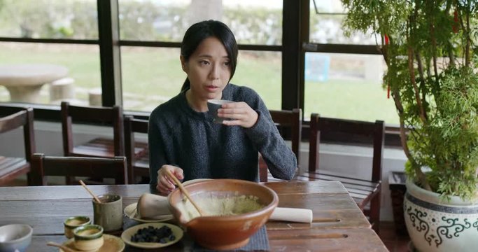 Woman drink of chinese ground tea