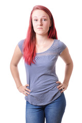 casual young woman is miffed. isolated on white. - obrazy, fototapety, plakaty