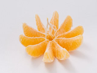 citrus fruit mandarin orange on white background with zest.