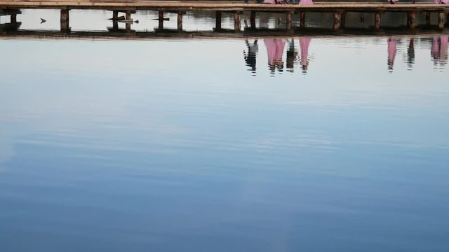 spouses and bridesmaids reflected on the lagoon of narta, Zvernec islet, Vlore, Albania