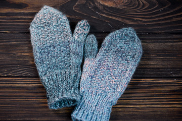 Warm mittens in openwork pattern with a warm scarf.
