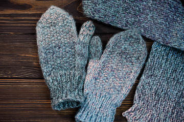 Warm mittens in openwork pattern with a warm scarf.