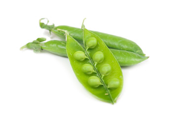green peas in pods on a white background