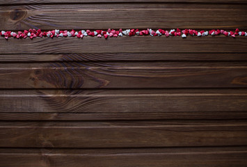 Heart shaped baking elements on the wooden background/ top arranged