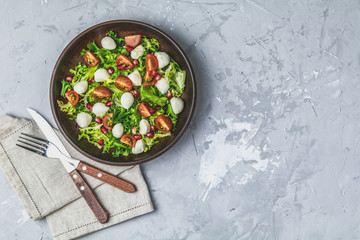 Fresh Cherry Tomato, Mozzarella salad with green lettuce mix