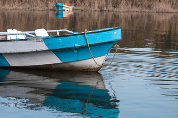 Fototapeta na wymiar boats in the lake near Siberia 