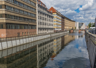 Naklejka premium Berlin, Germany - the Mittle district of Berlin presents a series of small canals which display many examples of contemporaty architecture