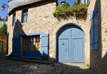 Fototapeta na wymiar Old stone house in Medieval town center of Dinan, France