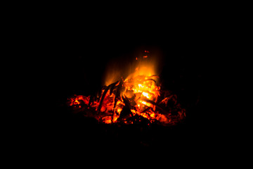 Forest fire silhouette Black background light