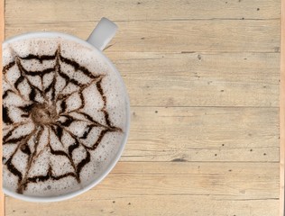 Coffee cup  on wooden background