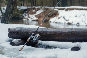 Fishing gear on the bank of a winter river.