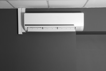 Modern air conditioner on wall