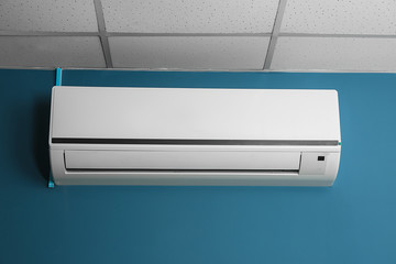 Modern air conditioner on wall