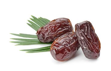 Sweet dried dates on white background