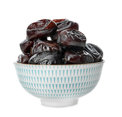 Bowl with sweet dried dates on white background