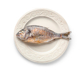 Plate with grilled dorado fish on white background