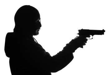 Silhouette of bandit with gun on white background