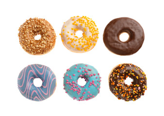 Sweet tasty donuts on white background