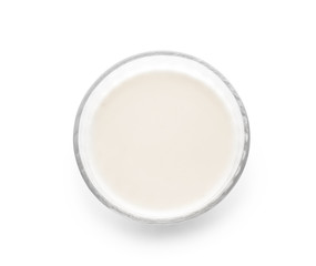 Glass of fresh milk on white background