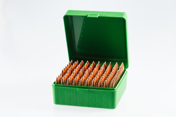 Hunting cartridges in a plastic box. Bullet storage box.