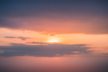 Sunset Sky in Bali - Echo Beach. Rising Sun on the Horizon. Beautiful Evening. Pink & Orange Blazing Sunset Clouds in Meadow and Orange Sky Above. Amazing Summer Sunrise as a Ocean Background. 