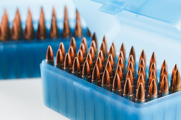 Hunting cartridges in a plastic box. Bullet storage box.