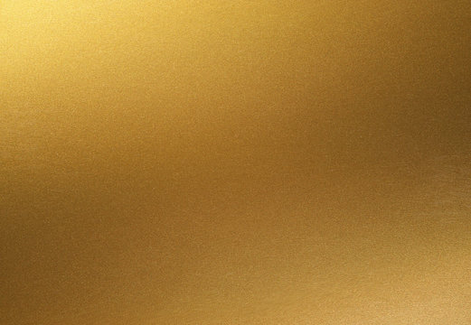 golden shiny gradient background. golden paper with metallic effect.