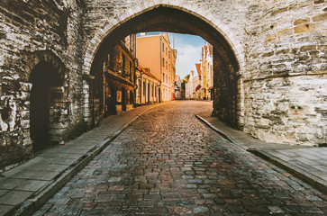 Fototapeta na wymiar Tallinn Old Town medieval cobblestone street Estonia touristic central popular landmarks cityscape Europe city travel
