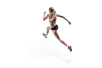 The one caucasian female silhouette of runner running and jumping on white studio background. The...