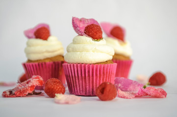 Delicious cupcakes with berries, close up