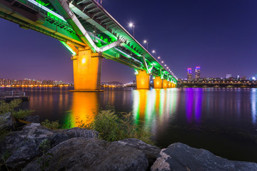 cheongdam bridge or cheongdamdaegyo is han river bridge at night in Seoul, South Korea.
