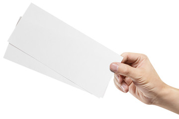 Male hand holding two blank sheets of paper (tickets, flyers, invitations, coupons, banknotes, etc.), isolated on white background - obrazy, fototapety, plakaty
