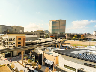 Aerial view downtown Las Colinas, Irving, Texas and light rail system (Area Personal Transit, APT)....