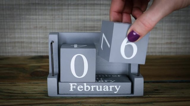 06 setting date on wooden cube calendar for February months. International Day of Zero Tolerance for Female Genital Mutilation