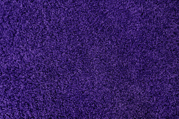 Ultra violet towel texture background. Violet terry towel texture.