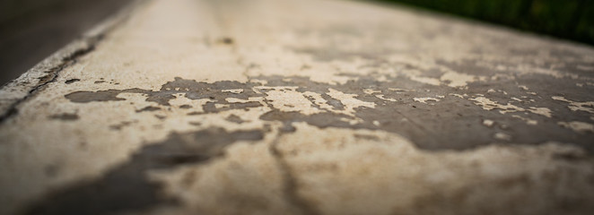 Textural background. Shabby paint stone surface.